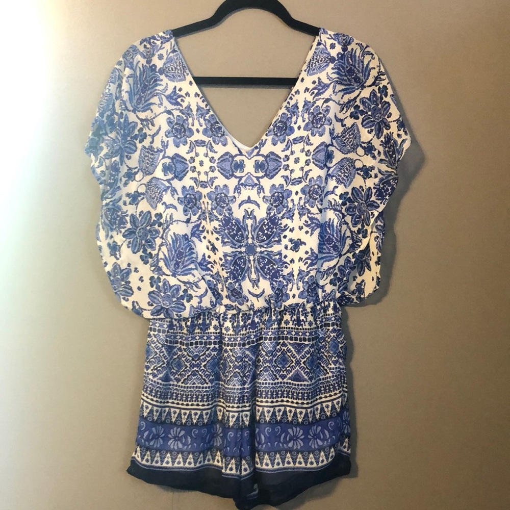 Floaty cap sleeve romper.